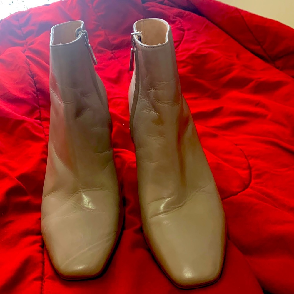 Very cute and nice boots a little wearing mark at the bottom but very nice color